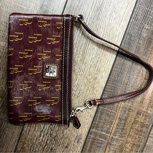 COPY - Dooney and Bourke wristlet.
